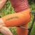 Bretelle masculino na cor laranja, modelo Marcio May da marca Moove, exibindo logo na lateral enquanto uma pessoa pedala.