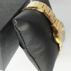 Relógio analógico feminino Lince LRGH034L B2KX dourado pequeno na internet