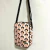 Shoulder bag Harry styles cabecinhas rosa na internet