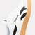 Imagen de REEBOK SMASH EDGE S BLANCO/NEGRO SUELA MARRON (REE100208245)