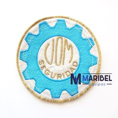 ESCUDO UOM SEGURIDAD
