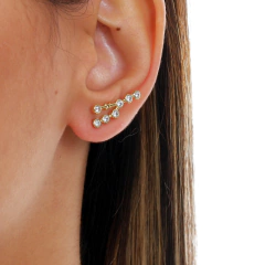 Pendiente de Tauro en oro 18K con Zafiros blancos o Brillantes en internet
