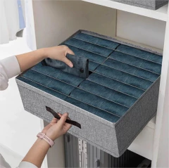 ORGANIZADOR DE TELA "FIKA" CON 16 DIVISIONES PLEGABLES Y MANIJA DE CUERO