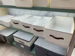 CAJA PLEGABLE "REMI" DE TELA "L" CON TAPA Y MANIJA DE CUERO