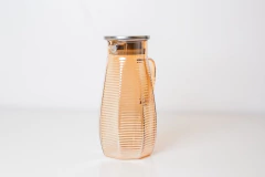 JARRA DE VIDRIO LABRADO MARRON CON TAPA 1400 ML en internet