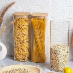 FRASCO DE VIDRIO " CAPRI" CON TAPA DE BAMBOO CUADRADA 10 X 27.5 CM