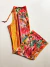 CALÇA TULE FLORAL COLORIDA