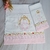 Kit de fraldas bordadas e personalizadas com detalhes florais, incluindo o nome do bebê bordado.