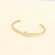 BRACELETE CRUZ METAL DOURADO - comprar online