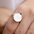 ANEL SÃO BENTO MADREPÉROLA COM CRISTAL ROXO na internet