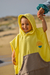 Poncho Indokids Sol combinado amarillo y marrón