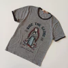 REMERA HERENCIA T.8 AÑOS GRIS VIRGEN RIDE THE GLOBE
