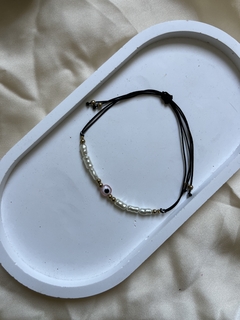 Pulsera de perla ojito rosa en internet