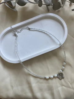 collar perla mariposa trans