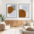 Quadro decorativo com formas geométricas em tons de marrom e cinza, em um ambiente moderno e aconchegante.