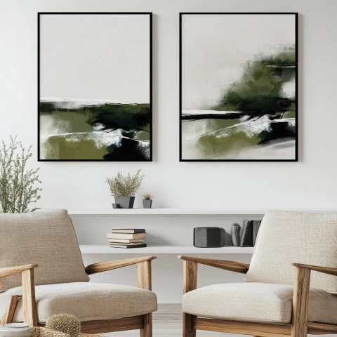 Quadro decorativo Reflexo em duas peças, com pintura abstrata em tons de verde e preto, emoldurado com moldura preta, exposto em um ambiente moderno com cadeiras de madeira.