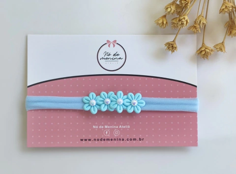 Faixa Florzinhas azul bebê