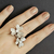 Anel Duas Flores Cravejadas com Zircônias 2850 - comprar online