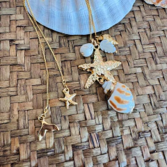 Gravatinha com estrela do mar e conchas dourada