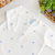 Macacão tricot branco poá azul na internet