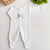 Macacão tricot branco - ursinho - comprar online