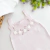 Jardineira tricot rosa bordada - comprar online