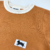 Remera CLUB Tostado en internet