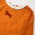REMERA CLUB M/L > Naranja - TRIBU® 