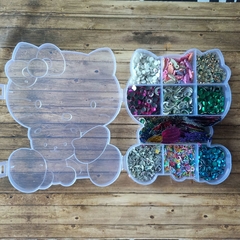 CAJA HELLO KITTY PLASTICA SORPRESA - ORGANIZADORA CON 10 DIVISIONES - CON EMBELLECEDORES Y COSAS VARIAS DENTRO en internet