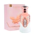 Perfume feminino Inspiro Woman EDP 100ml com frasco branco e detalhes em rosa dourado ao lado da embalagem rosa com logo de águia