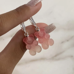 argollas con cubics y dije osito de goma rosa (Cod ar499) en internet