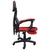 A imagem mostra uma cadeira gamer ergonômica moderna com um esquema de cores preto e vermelho. A cadeira possui apoios de braço ajustáveis, um encosto alto com material de malha respirável e está montada em uma base de estrela de cinco pontas com rodízios