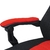 A imagem mostra uma cadeira gamer ergonômica moderna com um esquema de cores preto e vermelho. A cadeira possui apoios de braço ajustáveis, um encosto alto com material de malha respirável e está montada em uma base de estrela de cinco pontas com rodízios