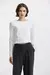 REMERA CROP RISS. AYRES en internet