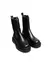 Botas Nube negras de diseño moderno con suela gruesa y detalles minimalistas. FEBO. 