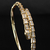 Bracelete retângulos cravejado em ouro 18K. 

Vendido e entregue por Dezoitok Joias.