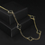 Corrente Trevo Preto de 60cm banhada a ouro 18K.