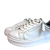 Zapatilla blanca y plata en internet