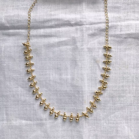 Colar alfinete dourado