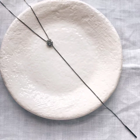 Gravatinha ponto de Luz único ródio