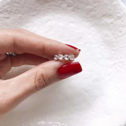 Piercing redondo bege