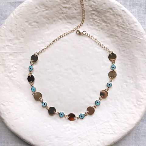 Choker olho grego com medalhas