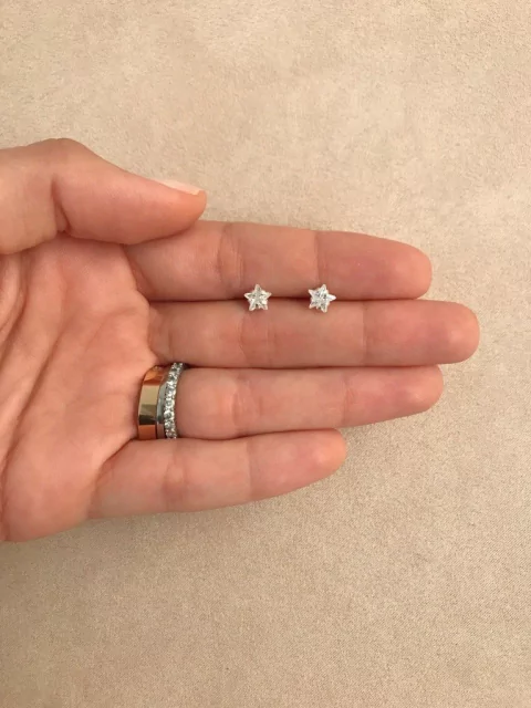 Brinco mini estrelinha prata 925