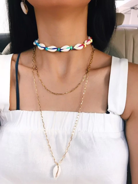 Choker de búzios neon