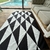 Alfombra textil liviana de cordura tamaño grande, no es vinílica pero si es impermeable, resistente y antidesgarro. Ideal para decorar el living y para exteriores. Panda Rojo Deco, decoración para tu hogar.