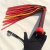 Flogger negro y rojo de cuerina 'Filotes' 20 colas - tienda online