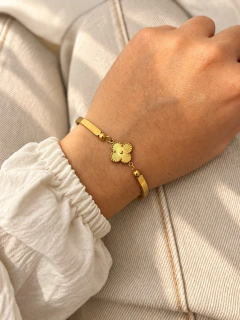 PULSERA VAN CLEEF RIGID - ACERO DORADO en internet