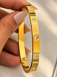ESCLAVA HELIOS - ACERO DORADO en internet