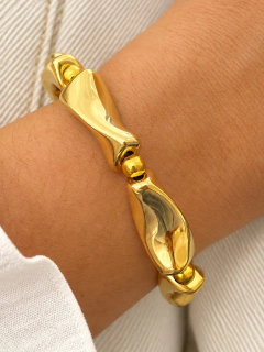 PULSERA ELASTIZADA MAGNETIC - ACERO DORADO en internet