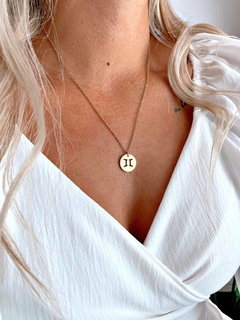 CONJUNTO ZODIACO GEMINIS - AC DORADO en internet